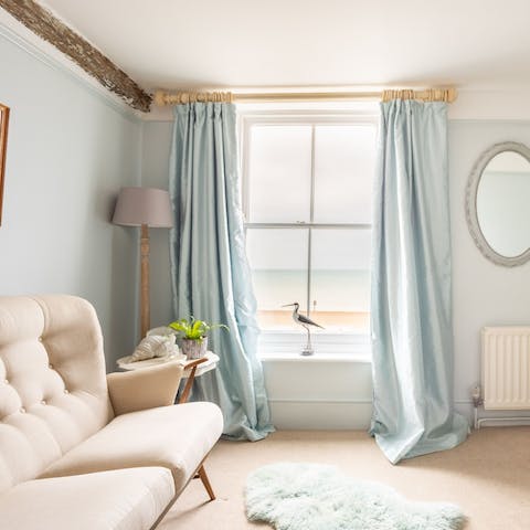 Enjoy calming sea views whilst relaxing by the window