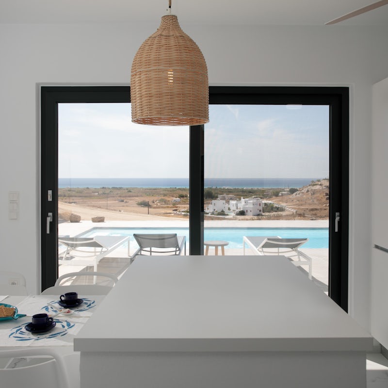 Prepare your meals with the light pouring in from sliding double doors