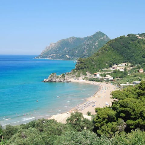 Drive ten minutes to beautiful Ermones beach to swim in the sea