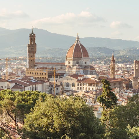 Stroll across the bridge and visit Florence's famous sights