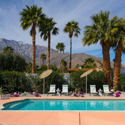 Gaze across the mountain views whilst relaxing by the pool