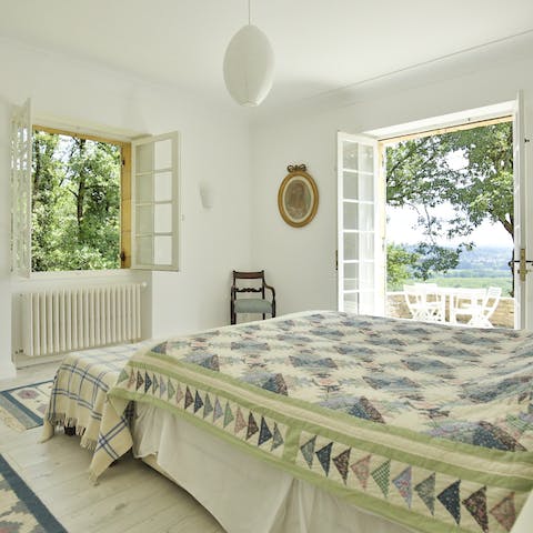 Wake up and throw open the French doors in the master suite