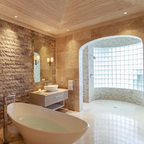Indulge in a soak session in one of the freestanding tubs