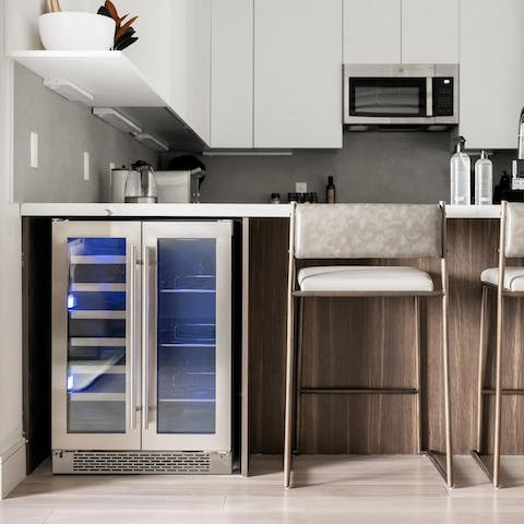Cook up a storm in the sleek kitchen, which has all the basics plus a wine fridge