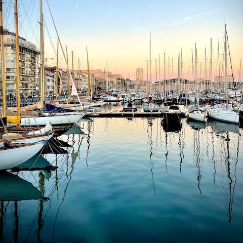 Explore the waterfront cafes and seafood restaurants around Marseille's Vieux-Port
