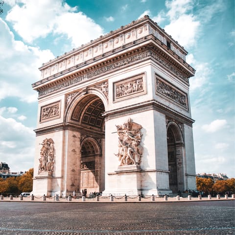 Visit the Arc de Triomphe, a ten-minute walk 