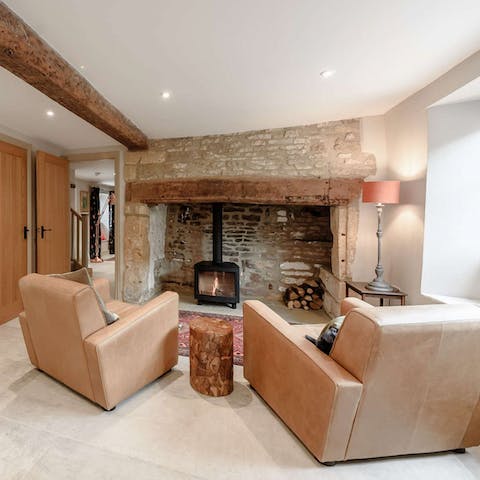 Snuggle up in front of log fires in the  living and family rooms