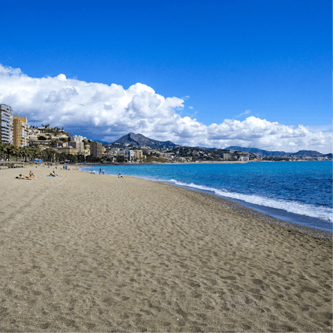 Take a ten-minute drive to the sandy shores of Malaga Beach
