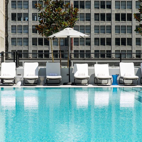 Take a morning swim in the building's rooftop pool