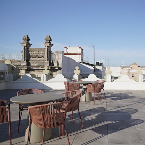 Start your mornings with a cup of coffee on the communal roof terrace