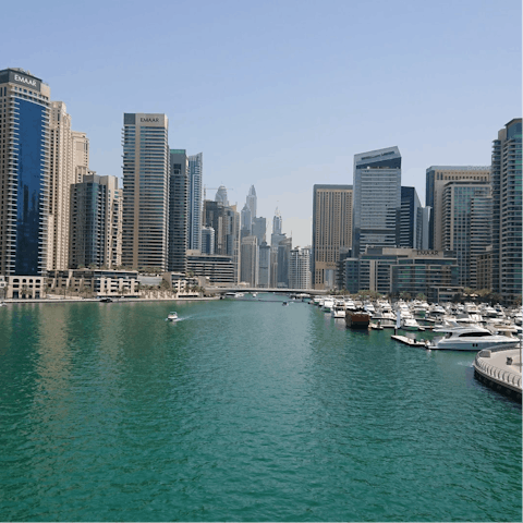Explore bustling Dubai Marina, a ten-minute taxi ride away