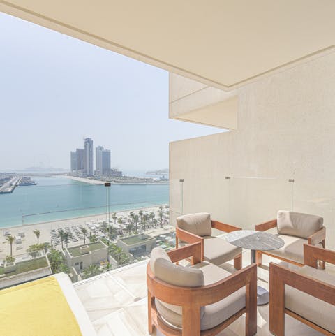 Start mornings with coffee on the private balcony while taking in picturesque sea views