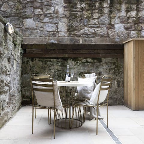 Enjoy an alfresco whisky on your private courtyard terrace