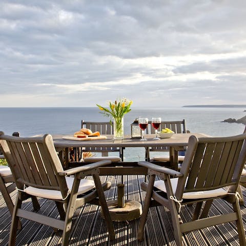 Cook a meal on the barbecue to enjoy on the terrace overlooking the water