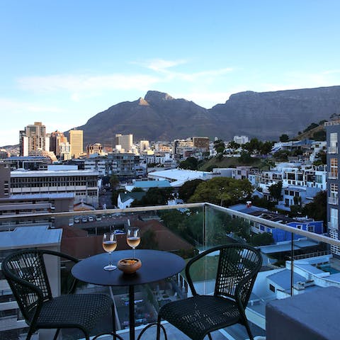 Sip a glass of chilled wine and soak up views of Table Mountain