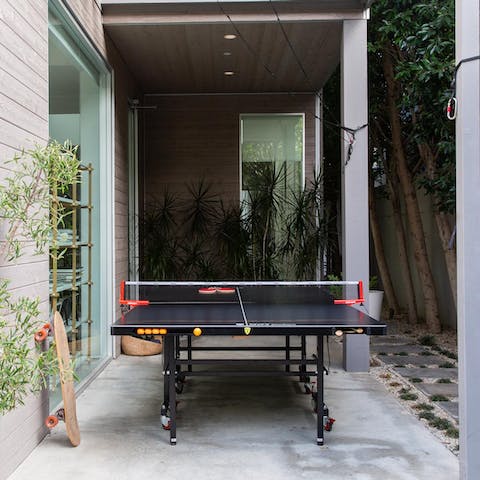 Get competitive around the ping pong table and basketball hoop