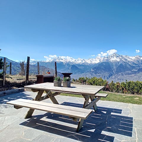Share am alfresco picnic with a stunning view over the mountains