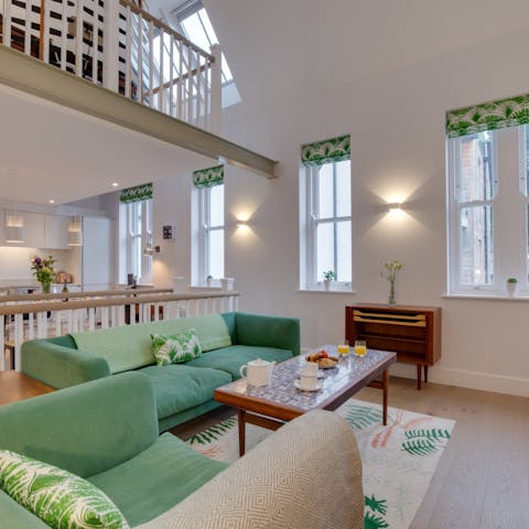 Admire the vaulted ceilings of the open-plan living space