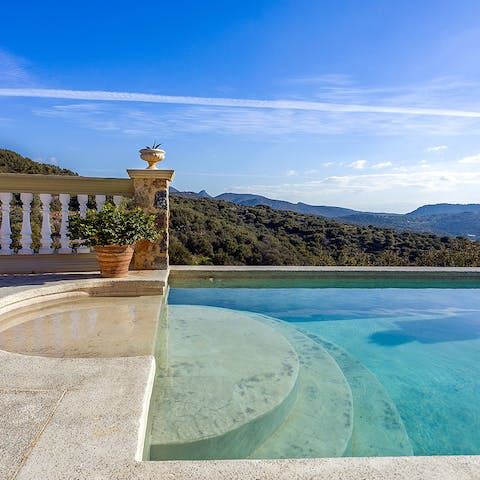 Enjoy breathtaking scenery as you soak in the private infinity pool