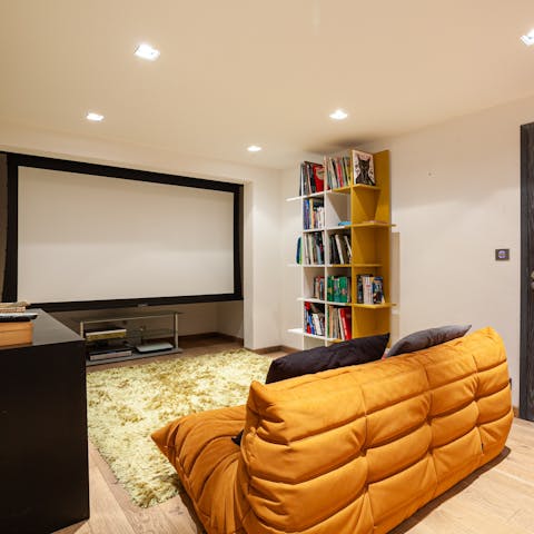 Grab some popcorn and host a movie night in the cinema room