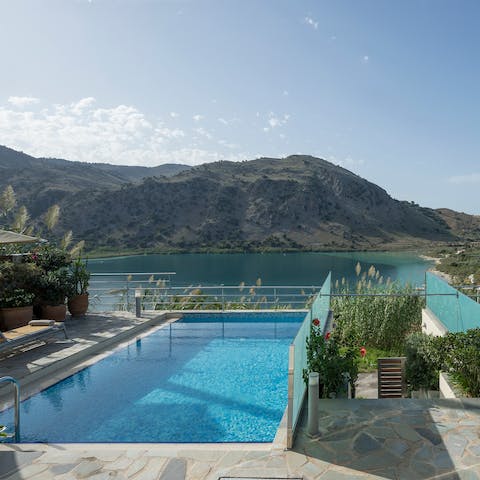 While away sunny hours in the private pool while taking in uninterrupted lake views
