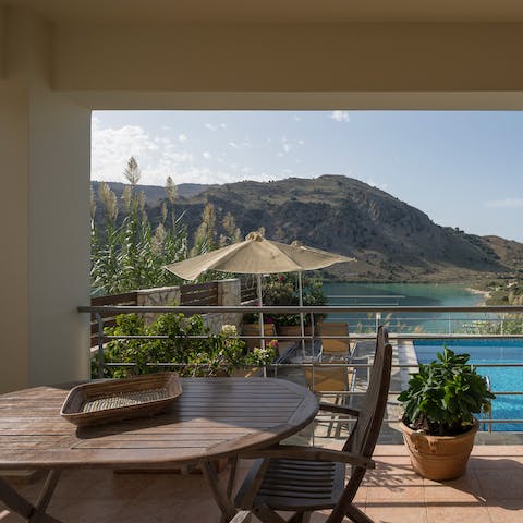 Sip your morning coffee on the terrace while admiring the lake and mountain scenery