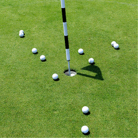 Tee off on the pitch-and-putt course at the edge of the grounds