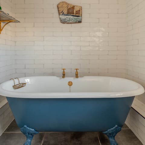 Soak in the freestanding tub with a glass of pinot noir