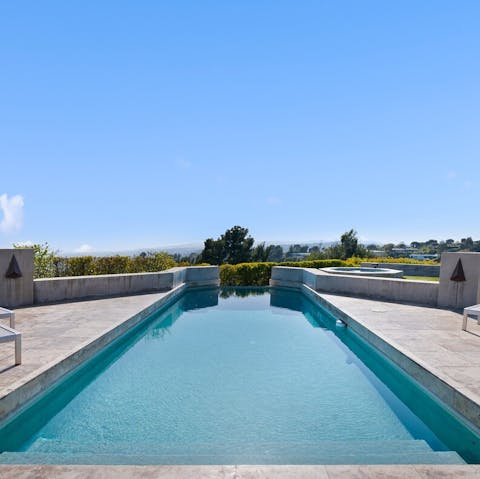 Take a dip in the private pool or unwind in the hot tub