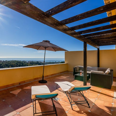 Soak up the sun and Mediterranean Sea views from the private terrace