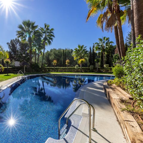 Cool off from the Spanish heat with a swim in the communal pool