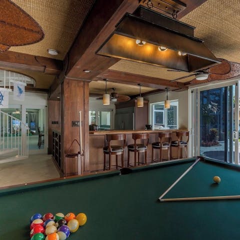 Play billiards and sip chilled beer in the games room