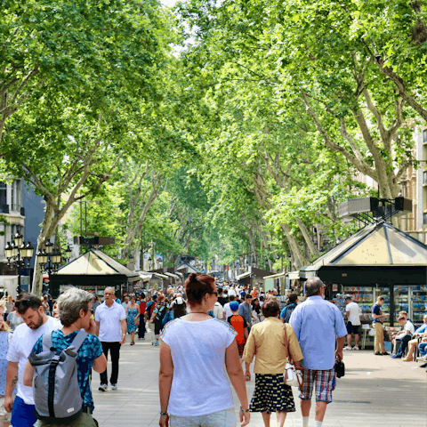 Enjoy a stroll down the tree-lined La Rambla, reachable on foot from your door