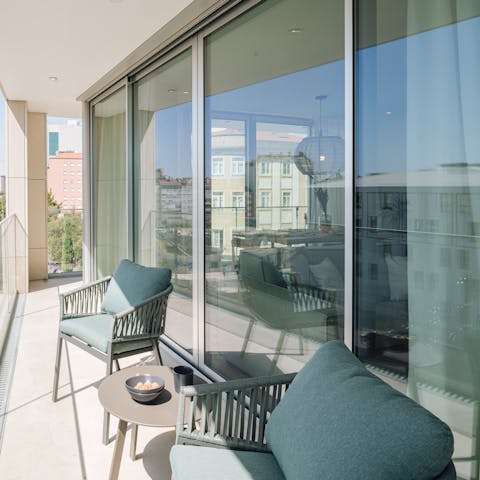 Soak up the morning sunshine with coffees on the private balcony