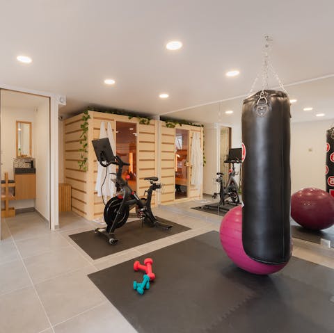 Work up a sweat in the private gym, complete with a private sauna