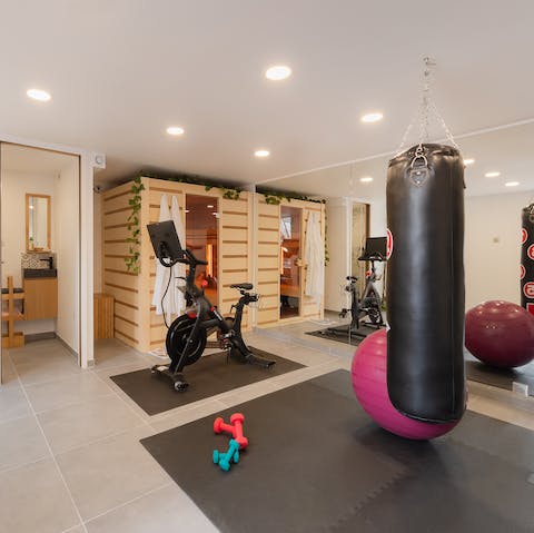 Work up a sweat in the private gym, complete with a private sauna