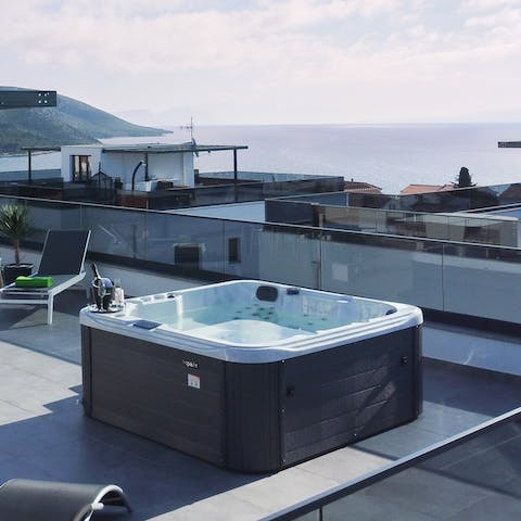 Enjoy a long, luxurious soak in the rooftop hot tub