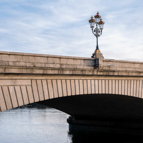 Admire the Thames from atop Putney Bridge, only a walk away