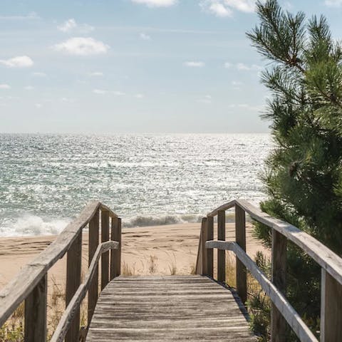 Step onto the beach down your private walkway