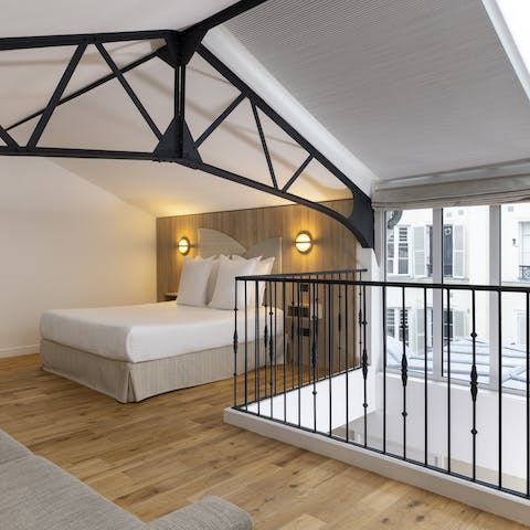 Let the light flood through the spacious mezzanine bedroom with ensuite