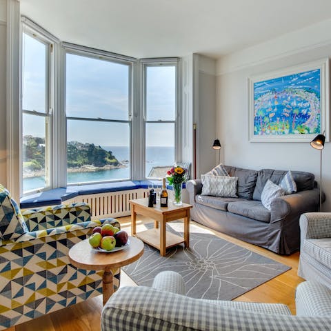 Admire the seascape from the living room's bay window
