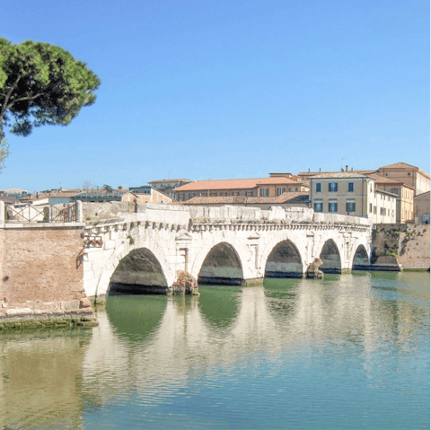Visit the Tiberius Bridge, a must-see in Rimini