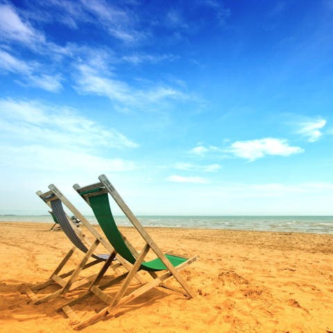 Sink your feet into the sand at nearby Tortuga beach