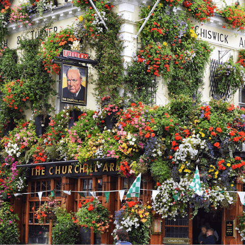 Get to know the local Notting Hill neighbourhood, including the flower-covered Churchill Arms pub