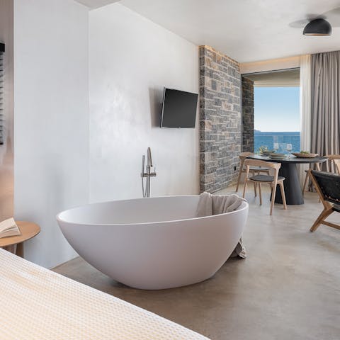Pamper yourself in the free-standing bathtubs after days of exploring Crete