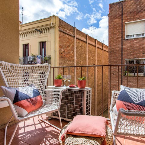 Bask in the sun's rays out on the home's balcony