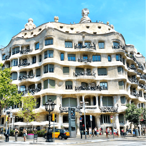 Join a guided tour around Casa Milà, a quarter of an hour's walk from your home