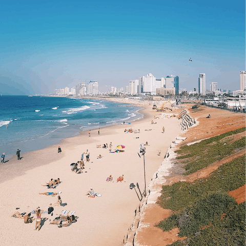 Spend the day on gorgeous Aviv beach, under a twenty-minute walk or just over a ten-minute ride away