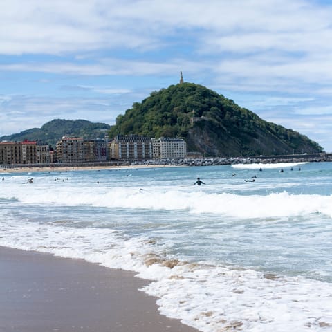 Revitalise in the waves of Zurriola beach, just a twelve-minute walk from your apartment