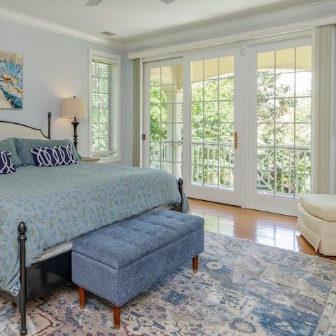 The master bedroom opens out to a beautiful balcony space